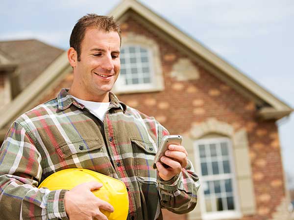 Contractor reviewing bids and site visits in BaseCloud CRM