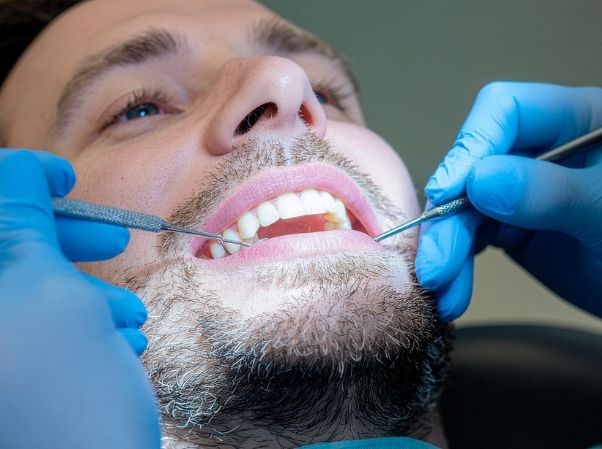 Dentist and practice team using BaseCloud CRM to manage patients and appointments